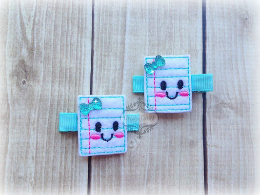 Notebook paper hair clip