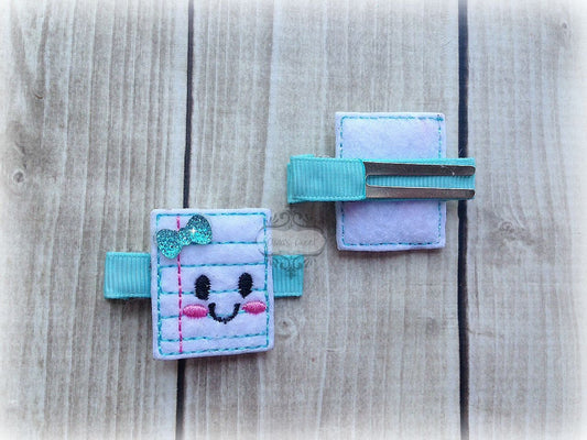 Notebook paper hair clip