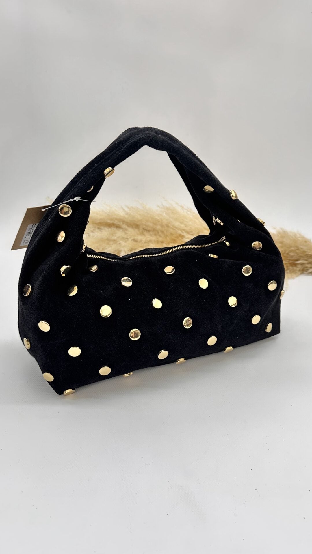 BORSA SCAMOSCIATA CON BORCHIE NERA